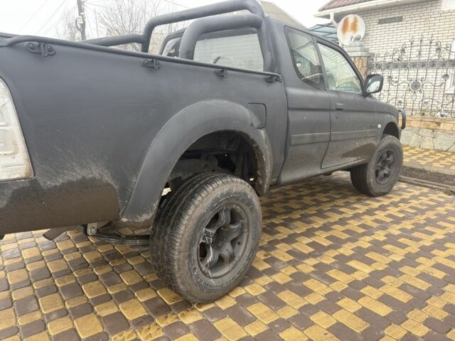 Чорний Міцубісі Л 200, об'ємом двигуна 2.5 л та пробігом 220 тис. км за 5600 $, фото 5 на Automoto.ua