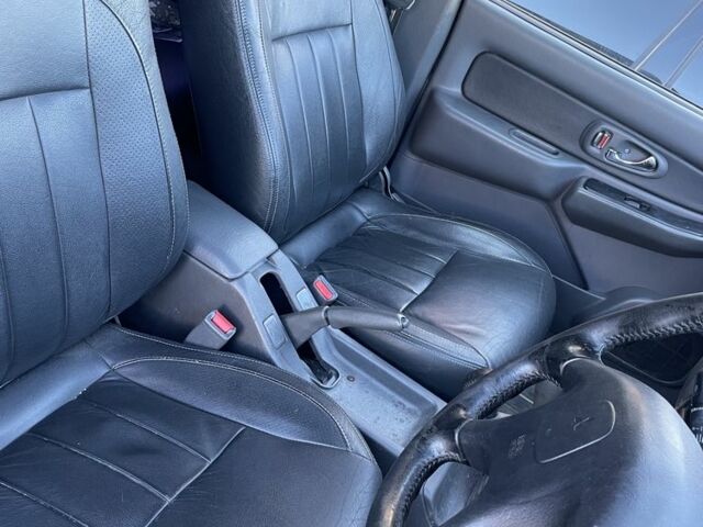 Черный Мицубиси Л 200, объемом двигателя 2.5 л и пробегом 220 тыс. км за 5299 $, фото 7 на Automoto.ua