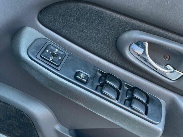 Черный Мицубиси Л 200, объемом двигателя 2.5 л и пробегом 220 тыс. км за 5299 $, фото 6 на Automoto.ua