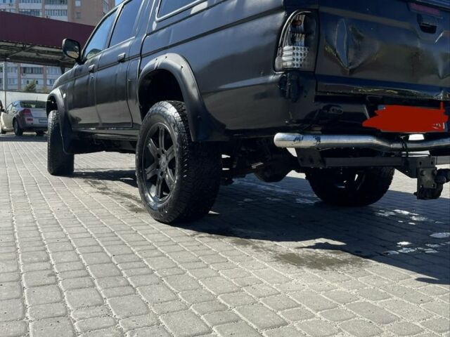 Черный Мицубиси Л 200, объемом двигателя 2.5 л и пробегом 220 тыс. км за 5299 $, фото 8 на Automoto.ua