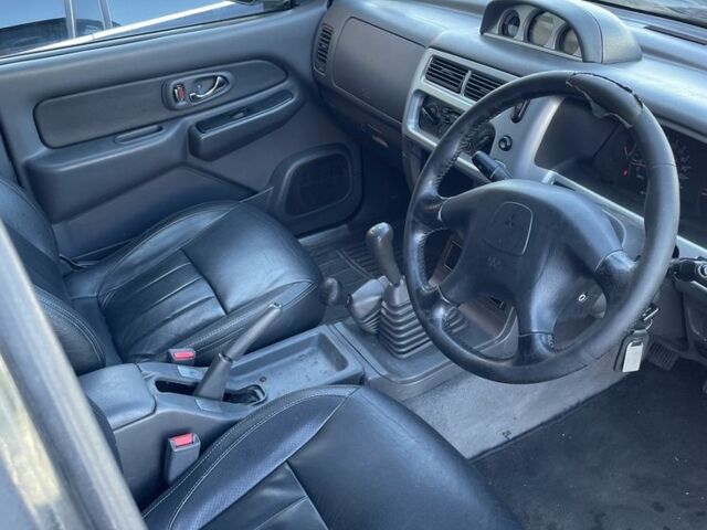 Черный Мицубиси Л 200, объемом двигателя 2.5 л и пробегом 220 тыс. км за 5299 $, фото 9 на Automoto.ua