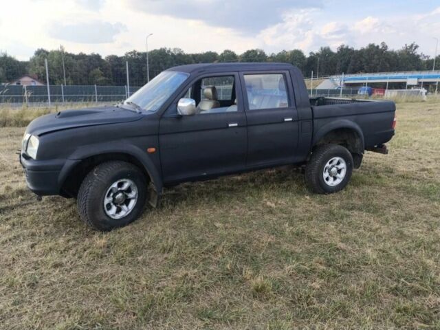 Чорний Міцубісі Л 200, об'ємом двигуна 0 л та пробігом 310 тис. км за 1802 $, фото 1 на Automoto.ua