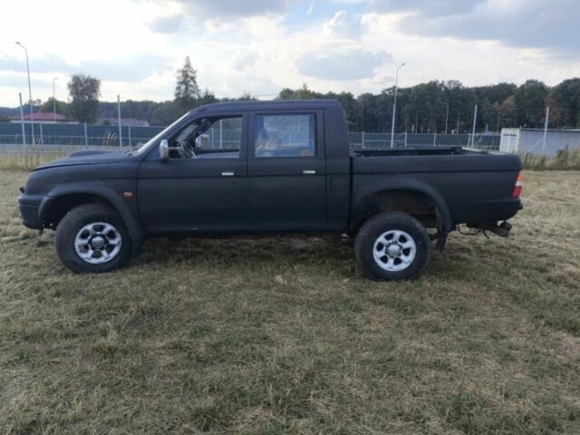 Чорний Міцубісі Л 200, об'ємом двигуна 0 л та пробігом 310 тис. км за 1802 $, фото 2 на Automoto.ua