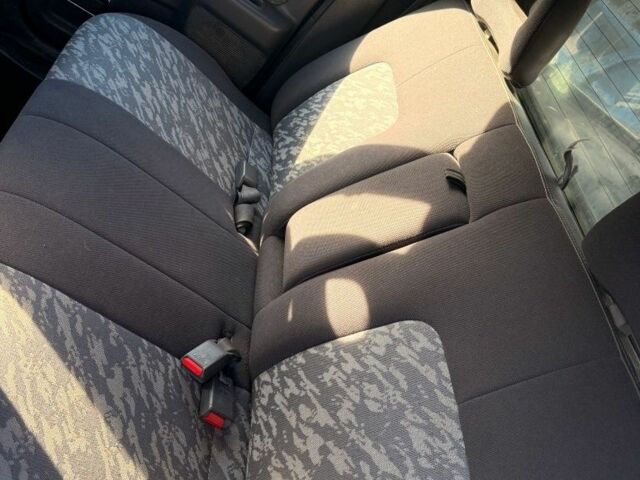 Черный Мицубиси Л 200, объемом двигателя 0 л и пробегом 225 тыс. км за 5205 $, фото 5 на Automoto.ua