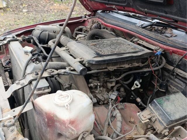 Черный Мицубиси Л 200, объемом двигателя 2.5 л и пробегом 500 тыс. км за 2611 $, фото 7 на Automoto.ua