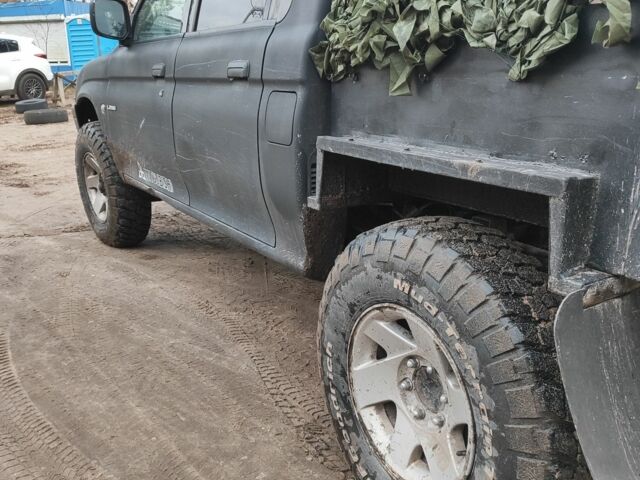 Чорний Міцубісі Л 200, об'ємом двигуна 0 л та пробігом 217 тис. км за 4300 $, фото 3 на Automoto.ua