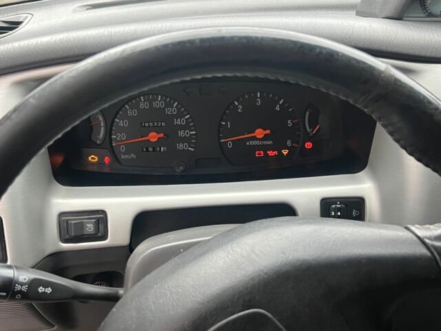 Мицубиси Л 200 2002 в Покровском на Automoto.ua Черный Мицубиси Л 200, объемом двигателя 2.5 л и пробегом 400 тыс. км за 5000 $, фото 2 на Automoto.ua
