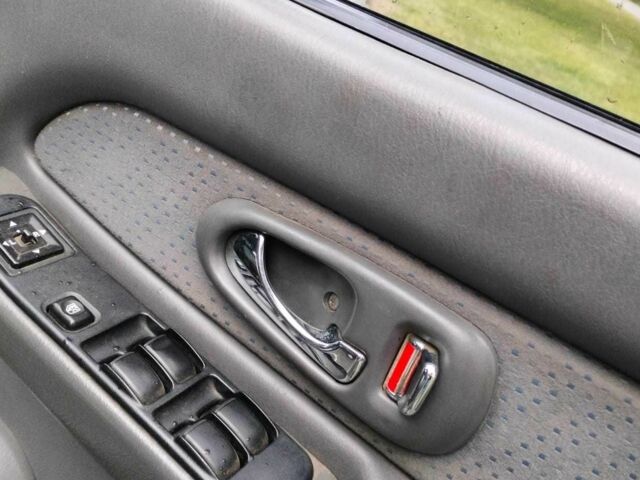 Чорний Міцубісі Л 200, об'ємом двигуна 2.5 л та пробігом 238 тис. км за 4500 $, фото 4 на Automoto.ua