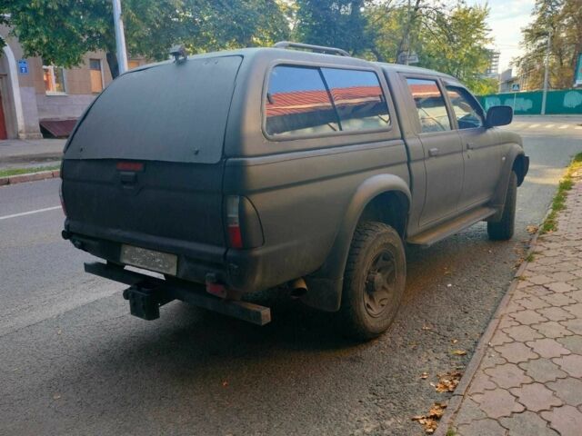 Чорний Міцубісі Л 200, об'ємом двигуна 2.5 л та пробігом 238 тис. км за 4500 $, фото 3 на Automoto.ua