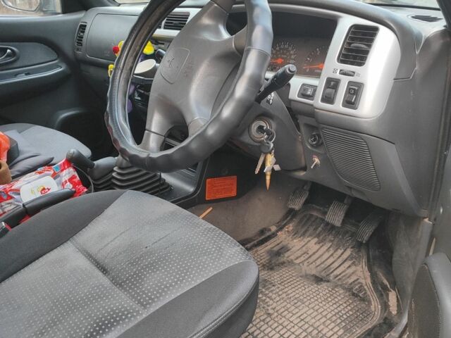 Чорний Міцубісі Л 200, об'ємом двигуна 0 л та пробігом 217 тис. км за 4300 $, фото 4 на Automoto.ua