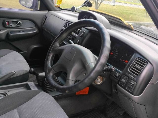Чорний Міцубісі Л 200, об'ємом двигуна 2.5 л та пробігом 238 тис. км за 4500 $, фото 5 на Automoto.ua