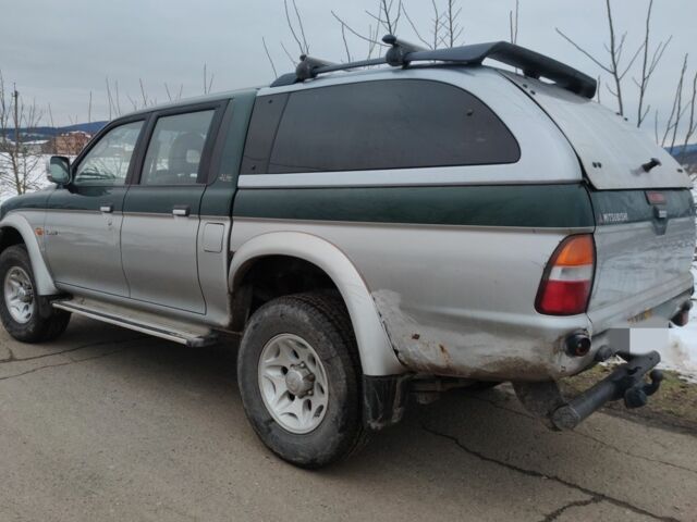 Черный Мицубиси Л 200, объемом двигателя 2.5 л и пробегом 120 тыс. км за 5500 $, фото 19 на Automoto.ua