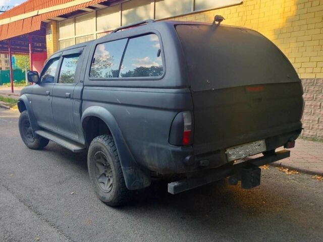 Чорний Міцубісі Л 200, об'ємом двигуна 2.5 л та пробігом 238 тис. км за 4500 $, фото 2 на Automoto.ua