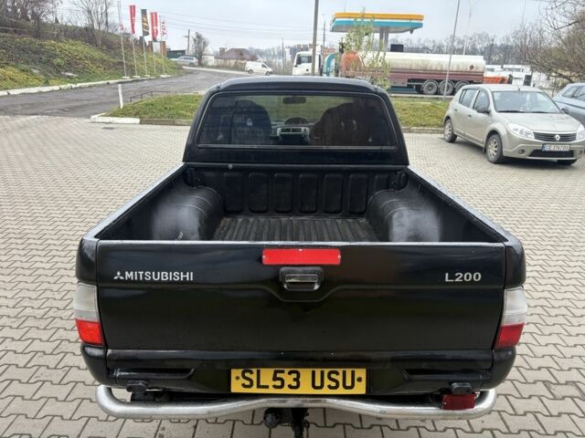 Чорний Міцубісі Л 200, об'ємом двигуна 2.5 л та пробігом 167 тис. км за 6647 $, фото 5 на Automoto.ua