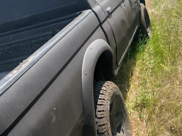 Черный Мицубиси Л 200, объемом двигателя 0 л и пробегом 530 тыс. км за 4100 $, фото 4 на Automoto.ua