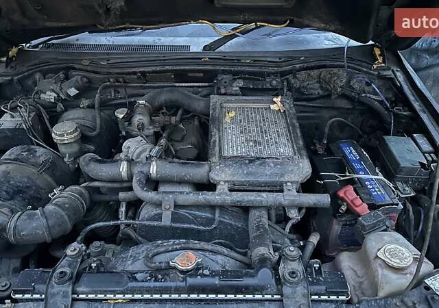 Черный Мицубиси Л 200, объемом двигателя 0 л и пробегом 300 тыс. км за 5000 $, фото 10 на Automoto.ua