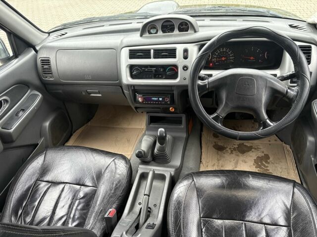 Чорний Міцубісі Л 200, об'ємом двигуна 2.5 л та пробігом 167 тис. км за 6647 $, фото 9 на Automoto.ua