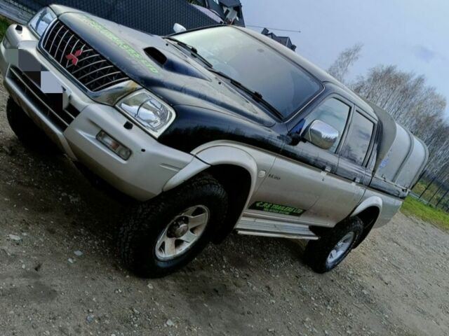 Чорний Міцубісі Л 200, об'ємом двигуна 2.5 л та пробігом 160 тис. км за 5600 $, фото 2 на Automoto.ua