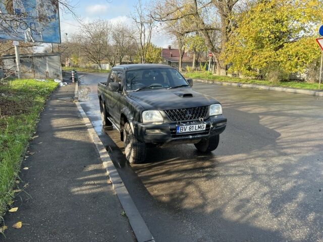Черный Мицубиси Л 200, объемом двигателя 2.5 л и пробегом 270 тыс. км за 3500 $, фото 6 на Automoto.ua