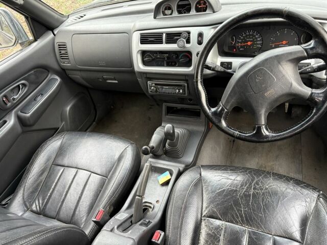 Чорний Міцубісі Л 200, об'ємом двигуна 2.5 л та пробігом 167 тис. км за 5674 $, фото 6 на Automoto.ua