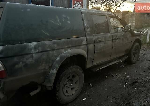 Черный Мицубиси Л 200, объемом двигателя 0 л и пробегом 300 тыс. км за 5000 $, фото 4 на Automoto.ua