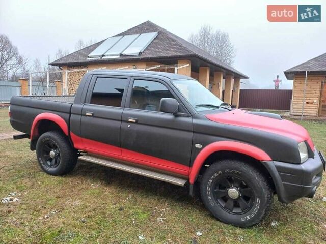 Чорний Міцубісі Л 200, об'ємом двигуна 0 л та пробігом 423 тис. км за 5908 $, фото 2 на Automoto.ua