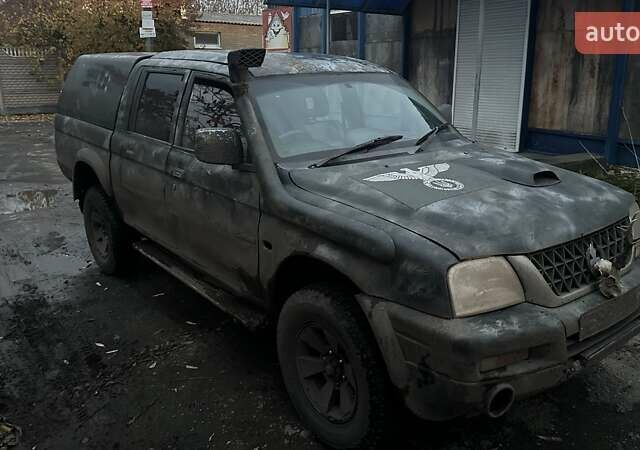 Черный Мицубиси Л 200, объемом двигателя 0 л и пробегом 300 тыс. км за 5000 $, фото 5 на Automoto.ua