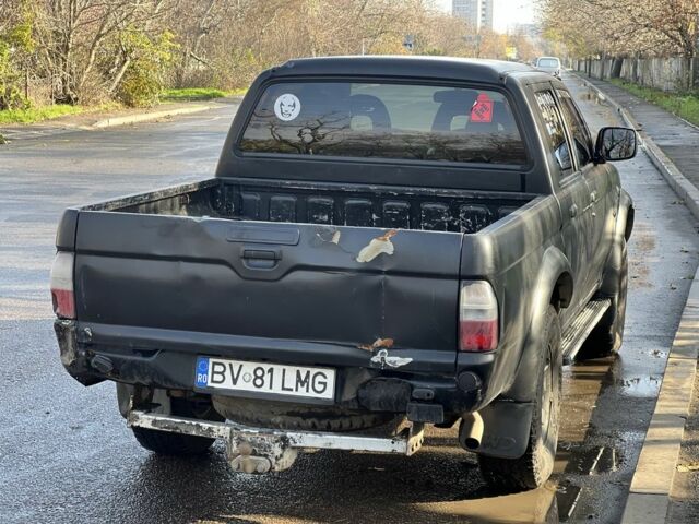 Черный Мицубиси Л 200, объемом двигателя 2.5 л и пробегом 270 тыс. км за 3500 $, фото 4 на Automoto.ua