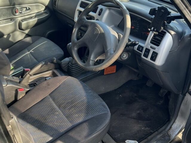 Черный Мицубиси Л 200, объемом двигателя 2.5 л и пробегом 270 тыс. км за 3500 $, фото 2 на Automoto.ua