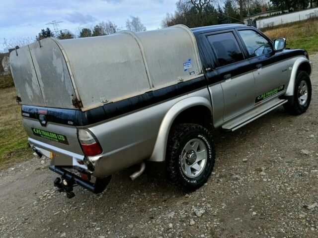 Чорний Міцубісі Л 200, об'ємом двигуна 2.5 л та пробігом 160 тис. км за 5600 $, фото 1 на Automoto.ua