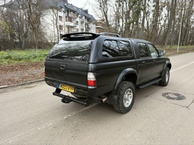 Чорний Міцубісі Л 200, об'ємом двигуна 2.5 л та пробігом 167 тис. км за 5674 $, фото 2 на Automoto.ua