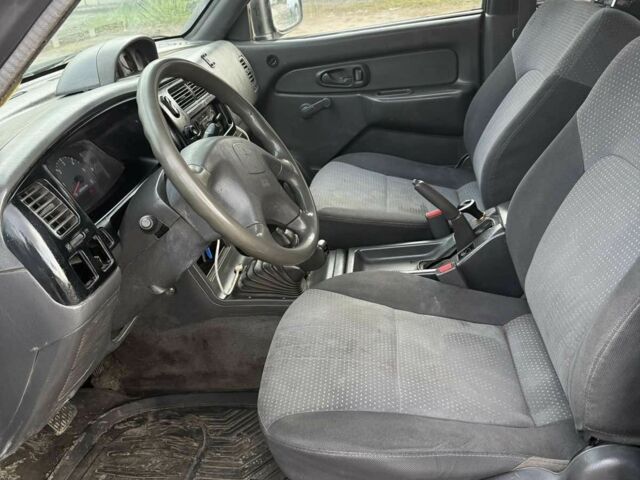 Мицубиси Л 200 2003 в Харькове на Automoto.ua Черный Мицубиси Л 200, объемом двигателя 3.2 л и пробегом 280 тыс. км за 3000 $, фото 6 на Automoto.ua