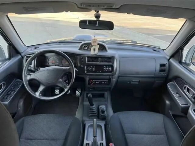 Мицубиси Л 200 2003 в Сумах на Automoto.ua Черный Мицубиси Л 200, объемом двигателя 2.5 л и пробегом 255 тыс. км за 2500 $, фото 4 на Automoto.ua