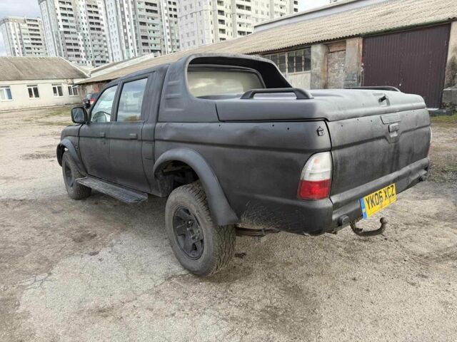 Мицубиси Л 200 2003 в Харькове на Automoto.ua Черный Мицубиси Л 200, объемом двигателя 3.2 л и пробегом 280 тыс. км за 3000 $, фото 5 на Automoto.ua