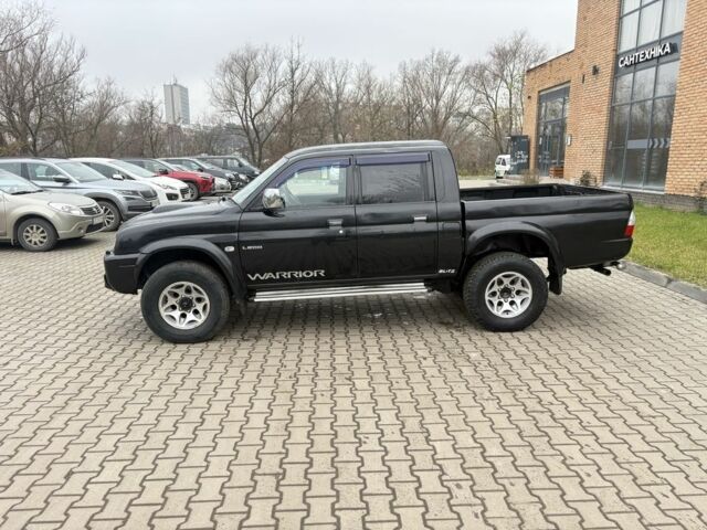 Чорний Міцубісі Л 200, об'ємом двигуна 2.5 л та пробігом 167 тис. км за 6647 $, фото 3 на Automoto.ua