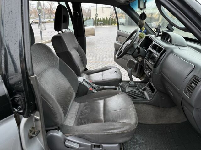 Черный Мицубиси Л 200, объемом двигателя 2.5 л и пробегом 355 тыс. км за 4500 $, фото 6 на Automoto.ua