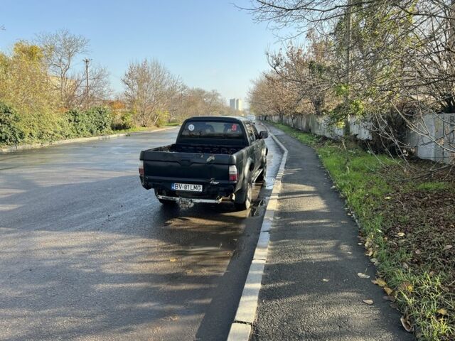 Черный Мицубиси Л 200, объемом двигателя 2.5 л и пробегом 270 тыс. км за 3500 $, фото 5 на Automoto.ua