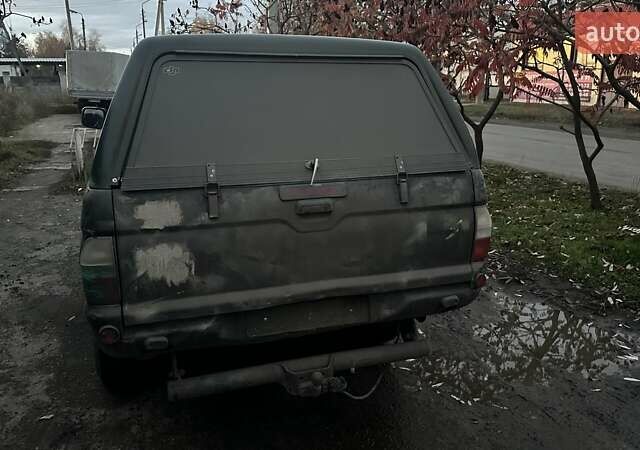 Черный Мицубиси Л 200, объемом двигателя 0 л и пробегом 300 тыс. км за 5000 $, фото 3 на Automoto.ua