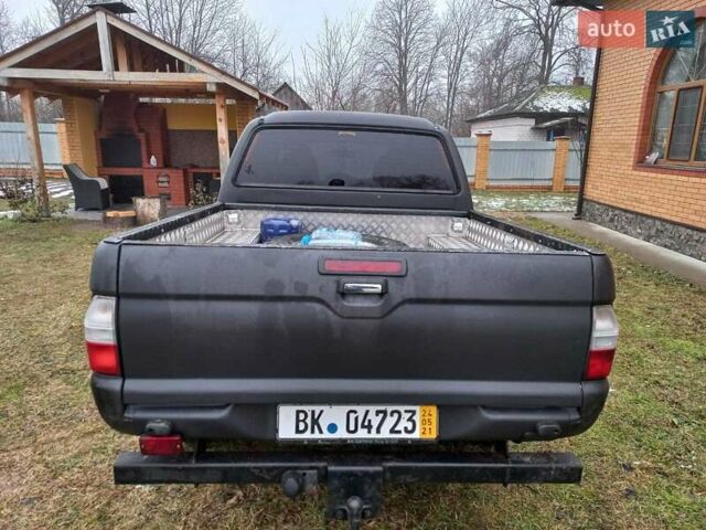 Чорний Міцубісі Л 200, об'ємом двигуна 0 л та пробігом 423 тис. км за 5908 $, фото 4 на Automoto.ua