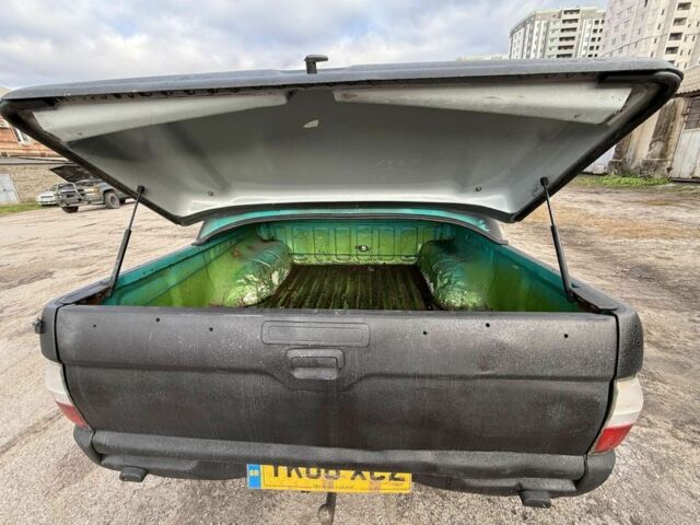 Мицубиси Л 200 2003 в Харькове на Automoto.ua Черный Мицубиси Л 200, объемом двигателя 3.2 л и пробегом 280 тыс. км за 3000 $, фото 8 на Automoto.ua