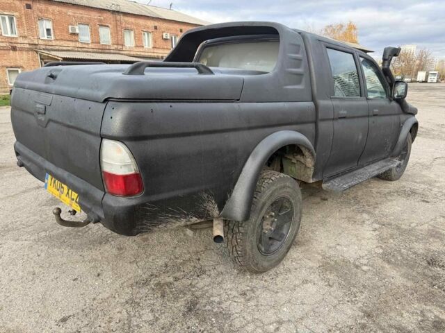 Мицубиси Л 200 2003 в Харькове на Automoto.ua Черный Мицубиси Л 200, объемом двигателя 3.2 л и пробегом 280 тыс. км за 3000 $, фото 2 на Automoto.ua