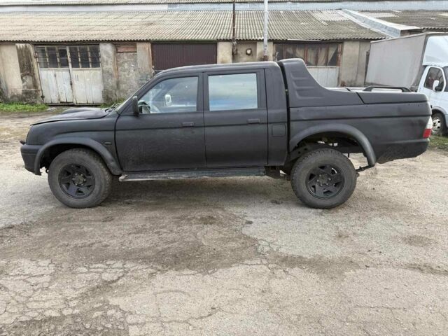 Мицубиси Л 200 2003 в Харькове на Automoto.ua Черный Мицубиси Л 200, объемом двигателя 3.2 л и пробегом 280 тыс. км за 3000 $, фото 4 на Automoto.ua