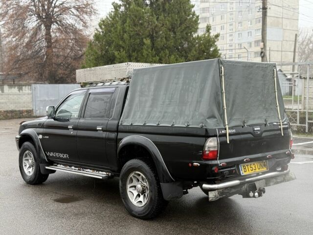 Чорний Міцубісі Л 200, об'ємом двигуна 0 л та пробігом 200 тис. км за 4600 $, фото 2 на Automoto.ua