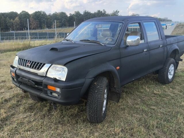 Черный Мицубиси Л 200, объемом двигателя 0 л и пробегом 150 тыс. км за 4667 $, фото 15 на Automoto.ua