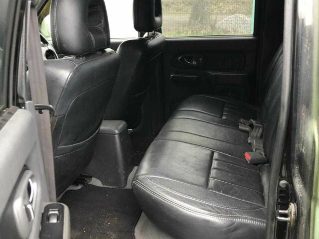 Мицубиси Л 200 2004 в Киеве на Automoto.ua Черный Мицубиси Л 200, объемом двигателя 2.5 л и пробегом 190 тыс. км за 8000 $, фото 8 на Automoto.ua