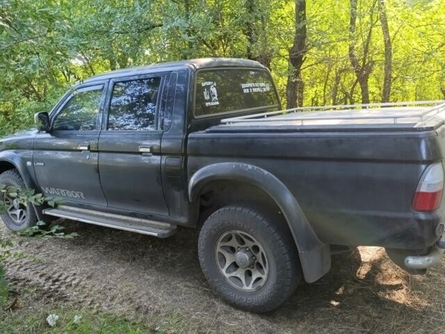 Чорний Міцубісі Л 200, об'ємом двигуна 2.5 л та пробігом 150 тис. км за 4800 $, фото 2 на Automoto.ua