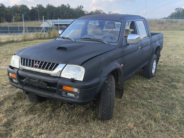 Черный Мицубиси Л 200, объемом двигателя 0 л и пробегом 150 тыс. км за 4667 $, фото 18 на Automoto.ua