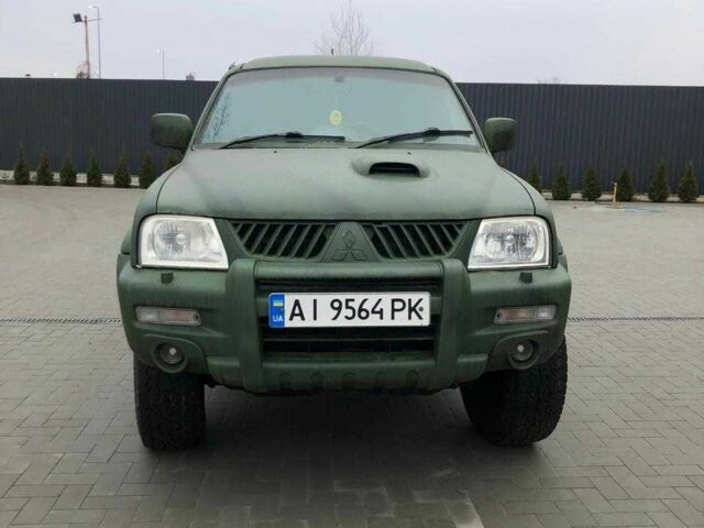 Мицубиси Л 200 2004 в Киеве на Automoto.ua Черный Мицубиси Л 200, объемом двигателя 2.5 л и пробегом 190 тыс. км за 8000 $, фото 1 на Automoto.ua