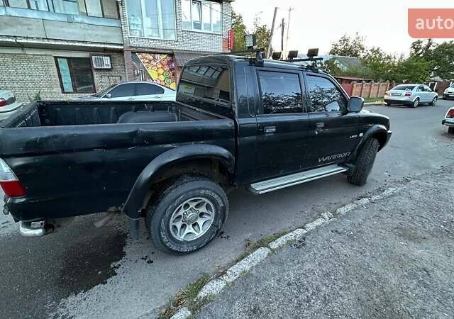Чорний Міцубісі Л 200, об'ємом двигуна 2.5 л та пробігом 240 тис. км за 6054 $, фото 2 на Automoto.ua