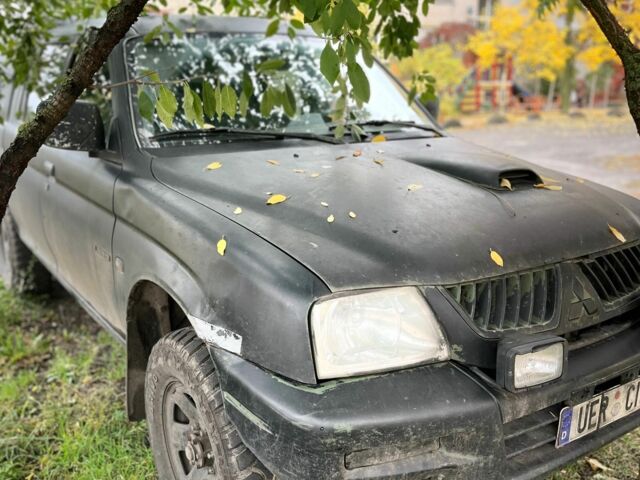 Чорний Міцубісі Л 200, об'ємом двигуна 2.5 л та пробігом 3 тис. км за 3700 $, фото 2 на Automoto.ua